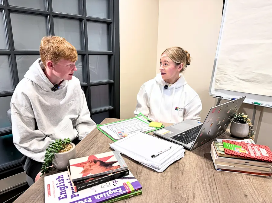 An Educamus tutor talking through a past paper question with a secondary school student